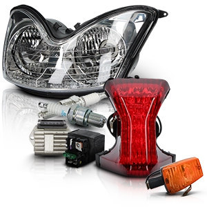 Diversi componenti per l'illuminazione delle motociclette, come fari, fanali posteriori e indicatori di direzione.